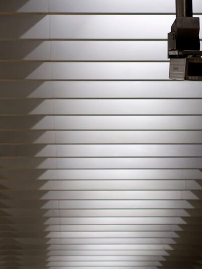 Surveillance camera mounted on a ceiling
