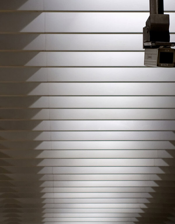 Surveillance camera mounted on a ceiling