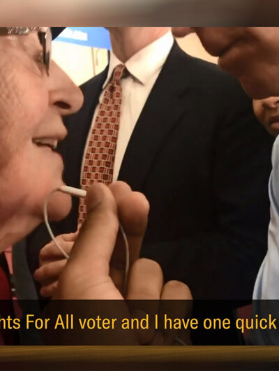 Nina Grey, ACLU’s Rights for All volunteer, questioning Joe Biden