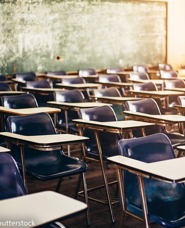 selective soft and blur focus.old wooden row lecture chairs in classroom in poor school.study room without student.