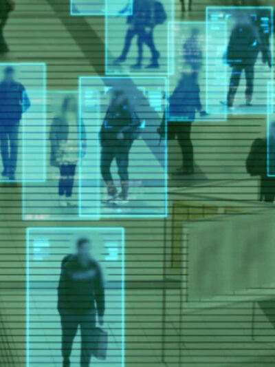 Scanning the crowd of people walking at the railway station. Surveillance interface using artificial intelligence and facial recognition.