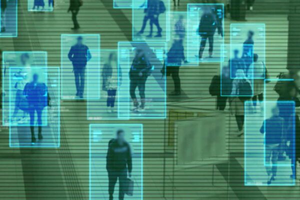 Scanning the crowd of people walking at the railway station. Surveillance interface using artificial intelligence and facial recognition.