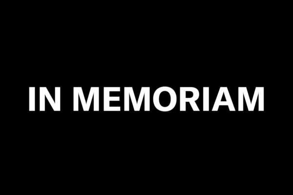 All caps text on black background reading, In Memoriam.