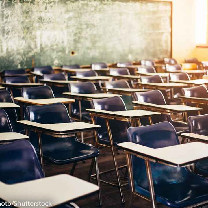 selective soft and blur focus.old wooden row lecture chairs in classroom in poor school.study room without student.