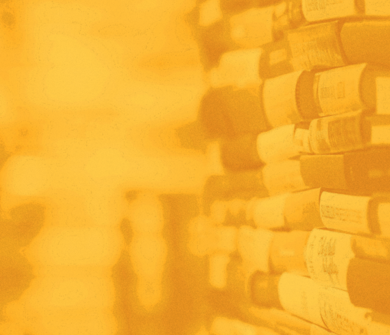 Books on a yellow background